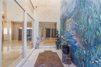 Bathroom with a towering ceiling