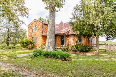 CEDAR SIDING ON A 2 STORY HOUSE THAT SITS ON 2 ACRES. WOODED LOT ALLOWS PRIVACY. DETACHED GARAGE WITH ATTACHED WORKSHOP, DETACHED SHED, LANDSCAPED