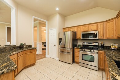 Granite countertops and stainless appliances in yo