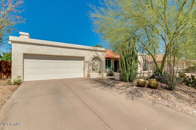 LONG DRIVEWAY TO THE 2&1/2 CAR GARAGE