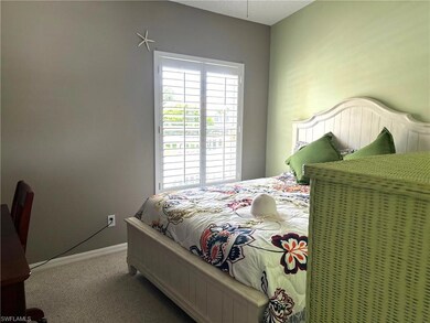 Bedroom with carpet and baseboards
