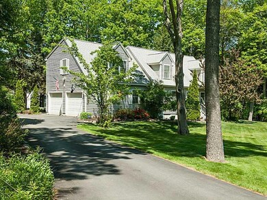 Exterior Front. Long paved driveway....