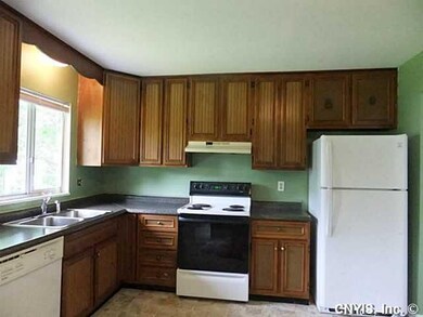 Kitchen New floor, counters and refrigerator
