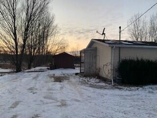 Side of house-Shed