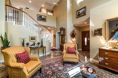 Another view of the living room featuring spiral s