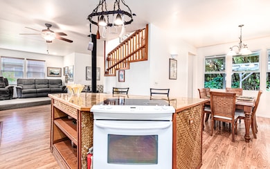 Stairway to 2nd floor is open to 1st floor living areas.  This increases light and air flow throughout home.