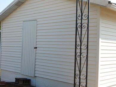 Side view of Shed w/ Storm Cellar