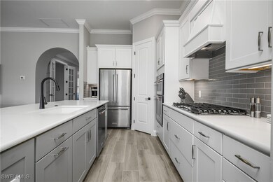 Kitchen includes upgraded cabinetry with soft close cabinets and pull out shelving, island also features additional storage on each end.