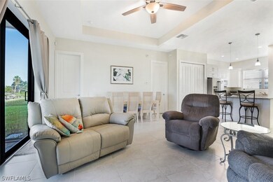 Spacious Great Room has a tray ceiling and an expa