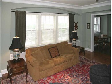 Open floor plan with beautifully finished hardwood