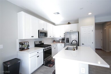 Kitchen with appliances with stainless steel finis