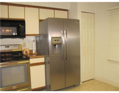 Kitchen. New Stainless Steel Electric Stove with a