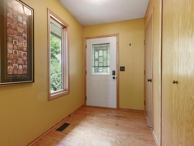 The entry has a convenient coat closet and doorway