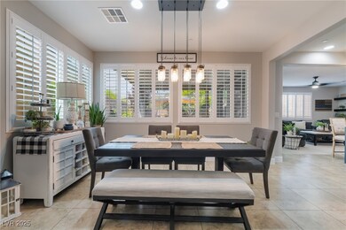 Dining area featuring light tile patterned floorin