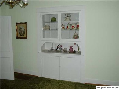FORMAL DINING ROOM WITH BUILT-IN CHINA CABINET