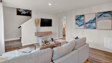 Living room featuring hardwood / wood-style floors