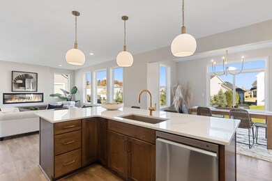 Large Island with large windows to keep the main floor bright