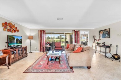 Tiled living room with ornamental molding