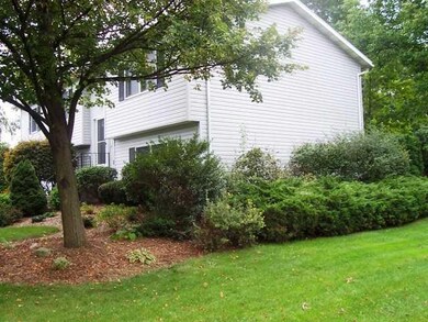 Exterior Front. Side view of home with landscaping