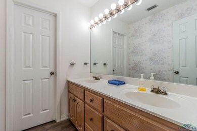 Bathroom featuring hardwood / wood-style flooring 