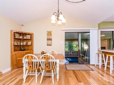 dining area right next to kitchen and screened in 