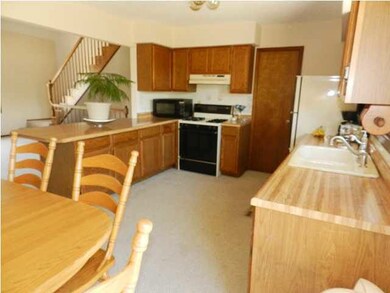 An additional view of the kitchen with a Pantry!
