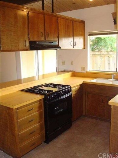 Another view of the kitchen with new range.