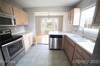 Kitchen with view of eat in area