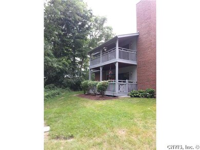 Backyard. Covered balcony overlooks treed private 