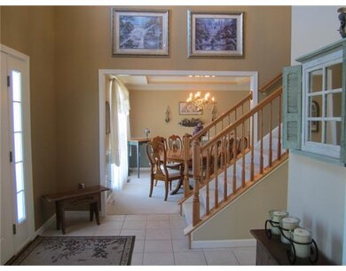 Entry/Foyer. 2 story foyer with ceramic tile entry. First floor powder room off hall.