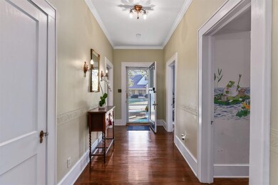 Entry way with orginial hardwood floors and origin