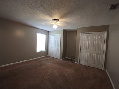 Master bedroom with 2 large closets