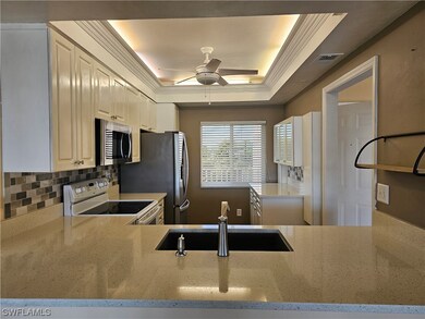 View into the kitchen from the dining area.