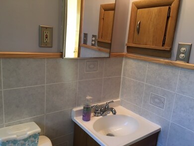 Unique access to Hall Storage Cabinet.