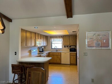 Kitchen and island view from dinning room