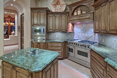 KITCHEN WITH GRANITE COUNTERS