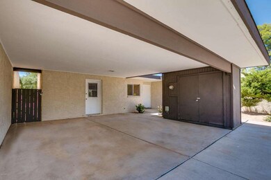 2 Car Covered Parking w/ Storage Room