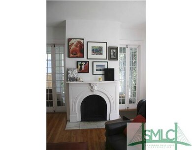 Living Room. Living room fireplace flanked by fren