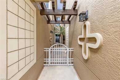 View of exterior entry featuring stucco siding