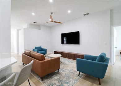 Living room featuring light hardwood / wood-style