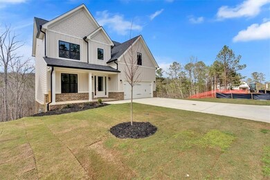 Modern farmhouse style home featuring concrete dri