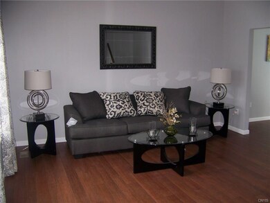 Great living room w/ fresh paint & new hardwood fl