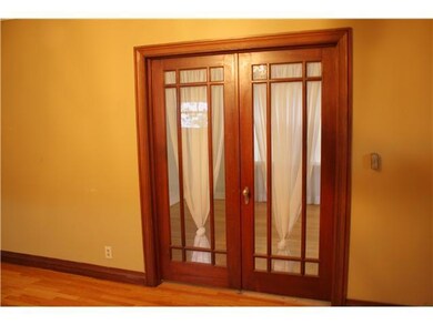 Living Room. Original French doors that lead into 