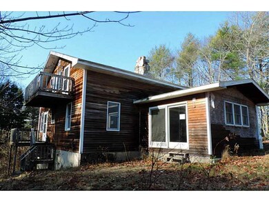 Exterior Back. elevated sunny lot