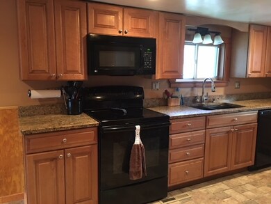 Newer Maple cabinets with granite counter top!