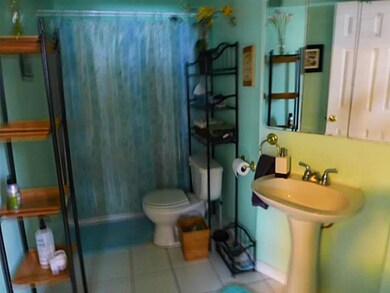 Bathroom. Downstairs full bathroom with pedestal s