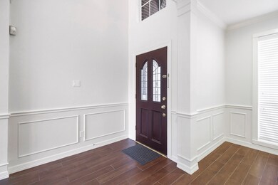 Inviting entrance. To the right is a formal living