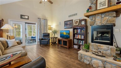 The family room leads directly to the four seasons