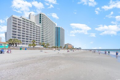 View of building exterior with a water view and a 