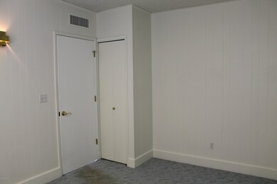 First of three bedrooms